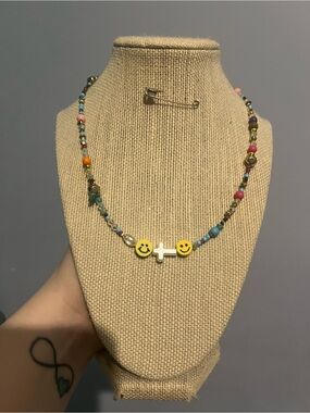#1. Handmade Beaded Colorful Smiley Necklace with Cross